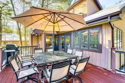Deck Table and Umbrella with seating for 8.  Also a BBQ grill 