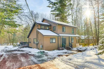 Side angled view of the house. Please note the ECV charger is free for guests' use.  Plenty of driveway space for your vehicles.