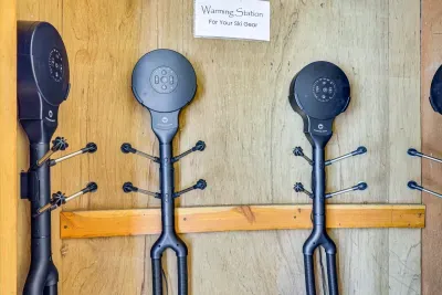 Outside closet with 4 warming stations for all your ski and jiking gear.  No more damp boots or gloves.