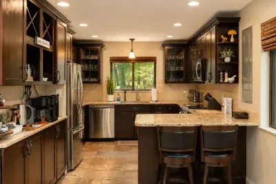 Prep, snack, and chat in a
spacious kitchen with
counter seating for two.
