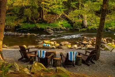 Creekside chairs turn
morning coffee and
fireside stories into
woodland magic.