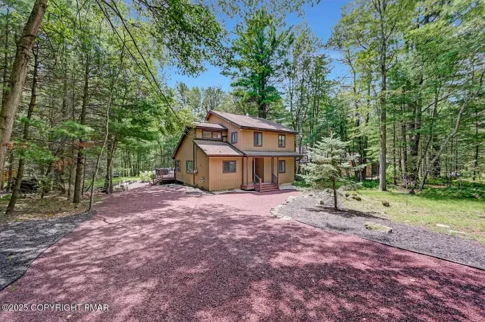 Pocono Pines vacation rental near Lake Naomi surrounded by wooded privacy and peaceful nature