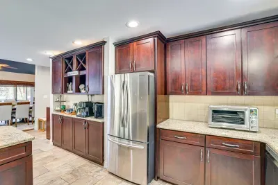 Fully Stocked Chefs kitchen with stainless steel appliances.