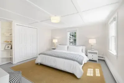 Located on the second floor, this comfortable king bedroom offers a spacious retreat. Please note, this room serves as the walk-through access to the private third-floor loft.