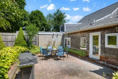 Gather 'round the patio area and make memories with a delicious barbecue. It's the perfect spot to spend quality time together outdoors!