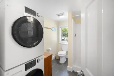 After a day of sun and surf, easily rinse off in our downstairs full bathroom's stand-up shower. Then, toss those wet swimsuits and towels right into the washer and dryer – keeping your packing light and your vacation easy!