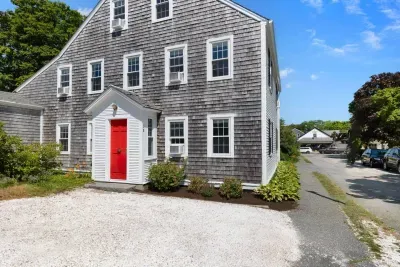 Look for the distinctive red door at the front of the beautiful white marble stone driveway. That's your private entrance!