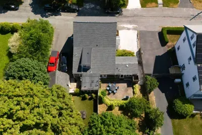 Get a bird's-eye view of our unique duplex! This aerial shot clearly shows the thoughtful design and complete privacy of each separate unit. 