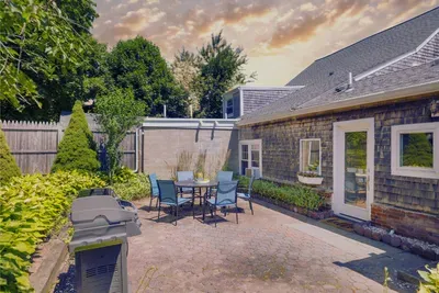 Gather 'round the patio area and make memories with a delicious barbecue. It's the perfect spot to spend quality time together outdoors!