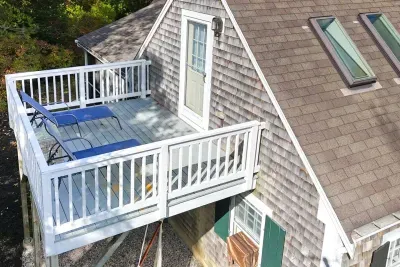 Balcony off 2nd bedroom with queen bed