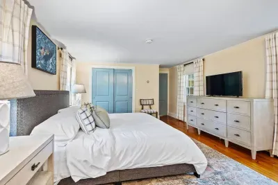 Primary bedroom featuring king bed