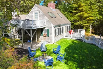 Cozy retreat with dual decks, well-care lawn, and a fire pit