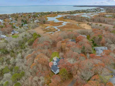 Peaceful coastal retreat surrounded by marsh views and mature trees