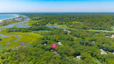 Private coastal retreat surrounded by marsh views and lush greenery