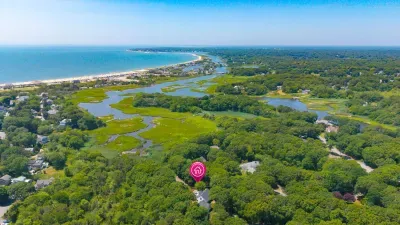 Peaceful coastal retreat near beach, marsh views, and lush greenery