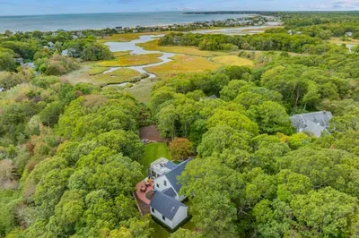 Secluded coastal retreat with marsh views and peaceful wooded privacy
