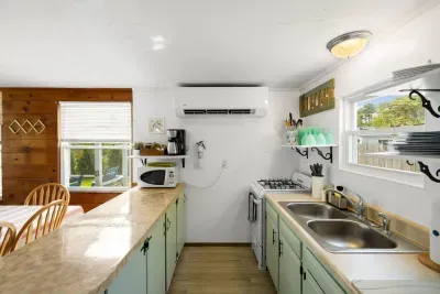 Whip up delicious meals after a fun day at the beach in your fully stocked kitchen – it's got everything you need!