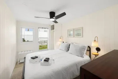 Sink into comfort in our cozy queen bed, ideally situated between the other two bedrooms for easy access.