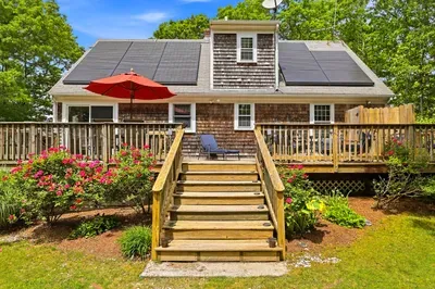 Spacious private deck with garden views and eco-friendly solar power