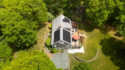 Private wooded retreat with spacious deck and sunny backyard