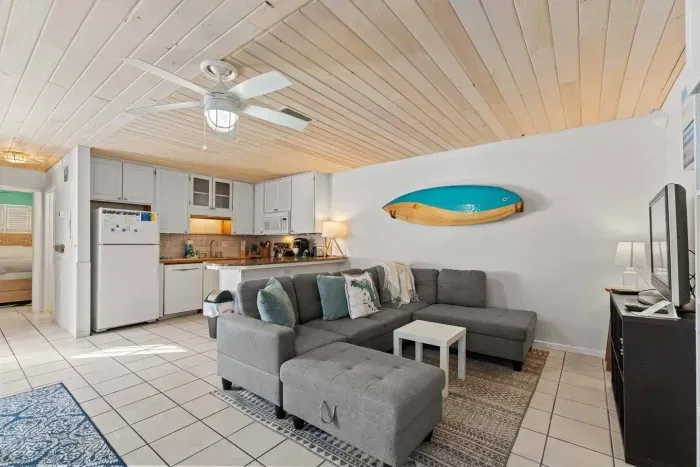 Relax in this open concept living area with a huge, comfortable sectional