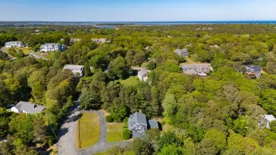 Private wooded retreat with spacious grounds and nearby coastal views