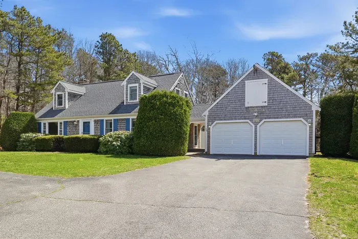 Storybook charm hidden in the hardwoods. Enjoy the rare luxury of wooded privacy and ample parking for a stress-free arrival at your home away from home.