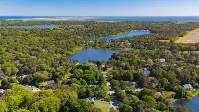 Scenic coastal retreat with ponds, lush greenery, and ocean nearby