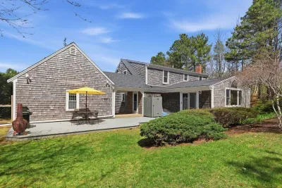 Sunny shingled retreat with deck, grill & spacious, private yard