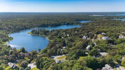 Scenic lakeside setting surrounded by lush trees and peaceful views