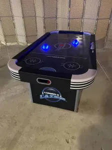 Air Hockey table in the basement shared with unit A