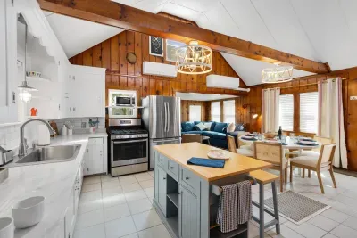 Front unit: prepare and enjoy your meals together right here at the house, table and isle kitchen