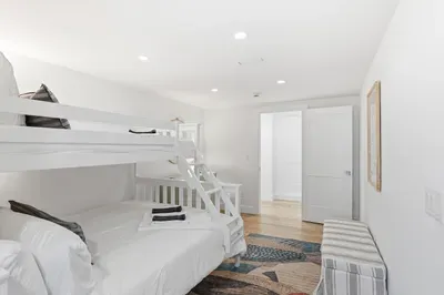 Bright bunk room with full-over-twin beds—perfect for families or groups