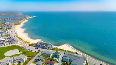Sweeping aerial beach views with easy shoreline access