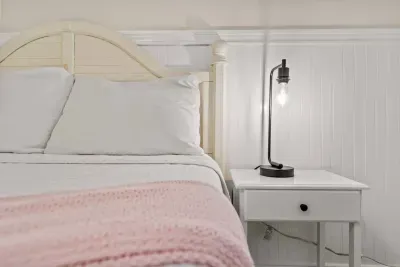 Quiet queen bed comfort and fresh linens.