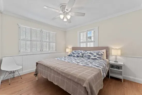 King bed: Sweet Dreams Await. Unwind after a long day in your cozy bed.