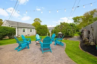 Gather around the inviting fire pit, which, while in a shared backyard area, is designated exclusively for guests of the Lobster Pot Getaway. Or when booking both places