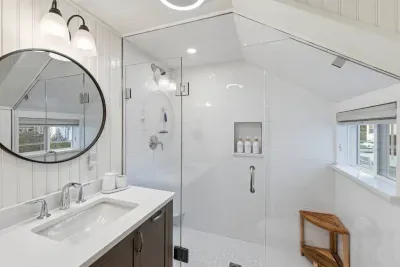 Start Fresh, Stay Sleek: Indulge in the beautiful ambient lighting and contemporary vanity. Your sleek, walk-in shower is fully stocked with complimentary shampoo, conditioner, and body wash for an effortless, spa-like escape.