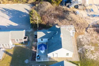 Nice aerial photo, parking for up to three vehicles available.