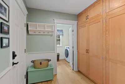 Heading out to the Cape Cod beaches or trails? Our mudroom offers a convenient place to keep your sandy shoes, towels, and outdoor essentials organized and ready to go.