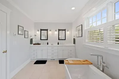 Picture this: Stepping into your primary ensuite, complete with a deep soaking tub for ultimate comfort and rejuvenation.