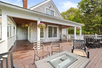 Cozy up around the fire pit table under a canopy of Cape Cod stars – the perfect way to end a relaxing evening.