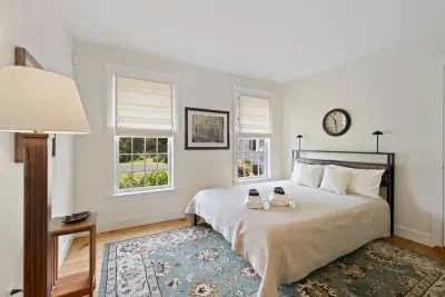 Experience comfort and ease in the downstairs queen bedroom, where a full bathroom is just a short stroll away.