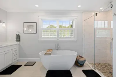 Master bathroom - First floor. After a day of exploring, you'll love unwinding with a relaxing bubble bath.