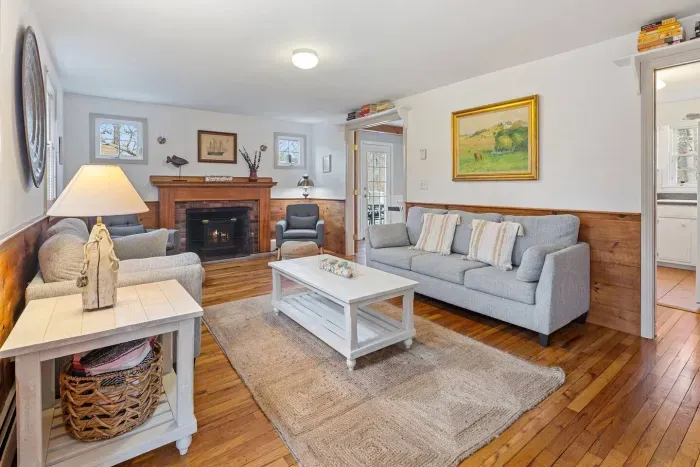 We love the contrast of the bright white walls and rustic wood accents.