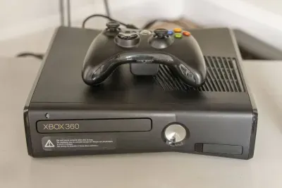 Xbox 360 console,  for gaming enthusiasts.