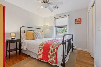 It features a comfy queen-size bed and a dresser/closet for storage. Don't worry about linens.