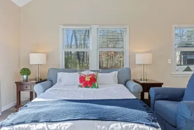 Bonus sleeping space! The sunroom features a comfortable sofa that converts to a full bed.