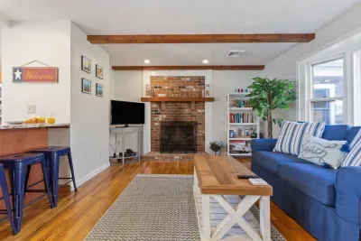 Includes a comfortable sofa, center table, and a TV with Xbox for gaming. With bookshelves, board games, and a coffee table.