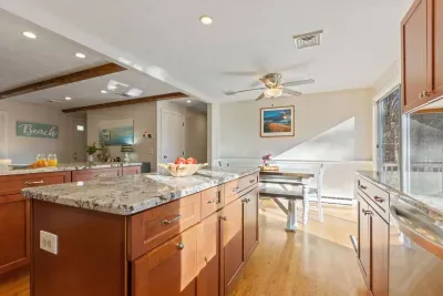 Enjoy the spacious island and breakfast bar for easy meal prep and casual dining